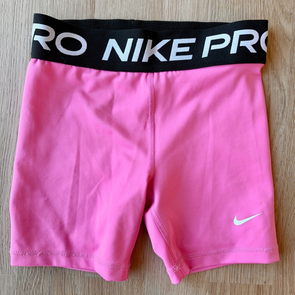 Youth Nike Pro Pink Dri-FIT Performance Shorts with Black Waistband